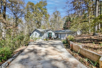 This lovely three-bedroom home features an office that could on Keowee Key Golf and Country Club in South Carolina - for sale on GolfHomes.com, golf home, golf lot