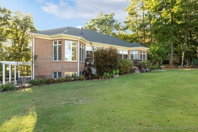 Stunning custom build, brick home, located in the gated and golf on Carolina Trace Country Club in North Carolina - for sale on GolfHomes.com, golf home, golf lot