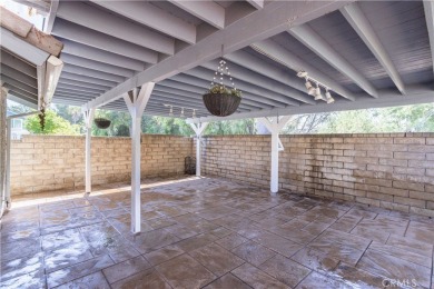 This beautiful home is nestled amidst gently rolling hills in on Vista Valencia Golf Course in California - for sale on GolfHomes.com, golf home, golf lot