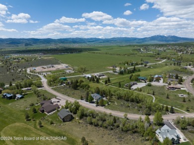 Step into a meticulously maintained interior boasting 4 bedrooms on Cedar Creek Golf Course in Wyoming - for sale on GolfHomes.com, golf home, golf lot