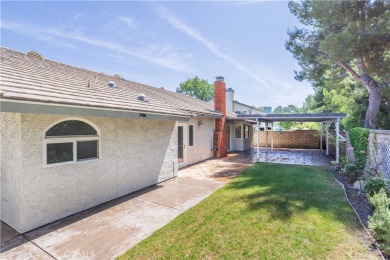 This beautiful home is nestled amidst gently rolling hills in on Vista Valencia Golf Course in California - for sale on GolfHomes.com, golf home, golf lot