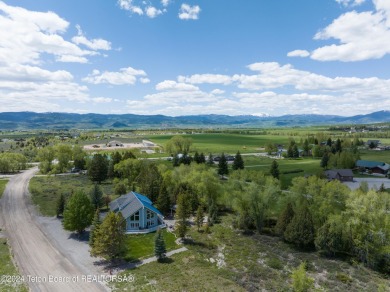 Step into a meticulously maintained interior boasting 4 bedrooms on Cedar Creek Golf Course in Wyoming - for sale on GolfHomes.com, golf home, golf lot