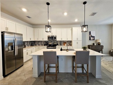 Enjoy elevated resort-style living in this beautiful Birkdale on Panther Run Golf Club in Florida - for sale on GolfHomes.com, golf home, golf lot