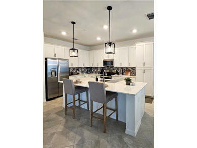 Enjoy elevated resort-style living in this beautiful Birkdale on Panther Run Golf Club in Florida - for sale on GolfHomes.com, golf home, golf lot