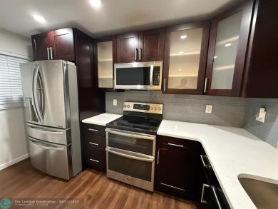 Experience the best of Pine Island Ridge in this spacious on Pine Island Ridge Country Club in Florida - for sale on GolfHomes.com, golf home, golf lot