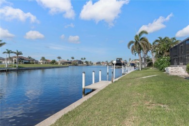 WATERFRONT GEM IN BURNT STORE ISLES - MOVE-IN READY W/SAIL on Twin Isles Country Club in Florida - for sale on GolfHomes.com, golf home, golf lot
