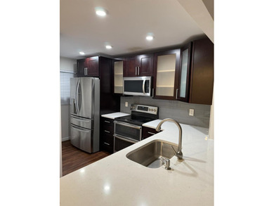 Experience the best of Pine Island Ridge in this spacious rarely on Pine Island Ridge Country Club in Florida - for sale on GolfHomes.com, golf home, golf lot