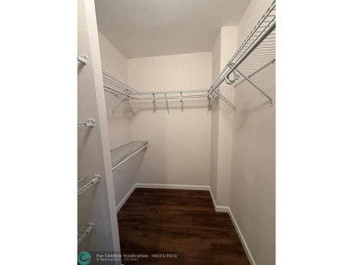 Experience the best of Pine Island Ridge in this spacious on Pine Island Ridge Country Club in Florida - for sale on GolfHomes.com, golf home, golf lot