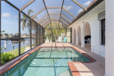 WATERFRONT GEM IN BURNT STORE ISLES - MOVE-IN READY W/SAIL on Twin Isles Country Club in Florida - for sale on GolfHomes.com, golf home, golf lot