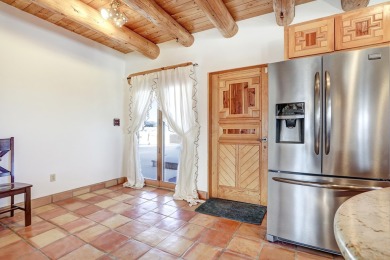 Discover the perfect blend of Southwestern charm and modern on Taos Country Club in New Mexico - for sale on GolfHomes.com, golf home, golf lot