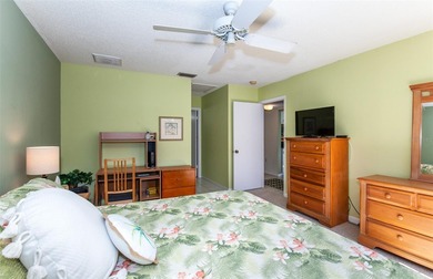 Welcome to Bird Bay Village, a fabulous resort-style condominium on Bird Bay Executive Golf Club in Florida - for sale on GolfHomes.com, golf home, golf lot