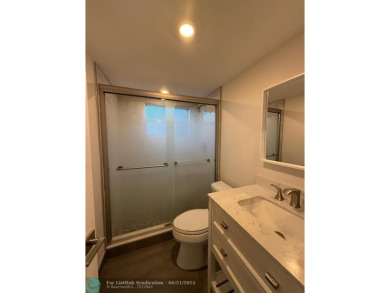 Experience the best of Pine Island Ridge in this spacious on Pine Island Ridge Country Club in Florida - for sale on GolfHomes.com, golf home, golf lot