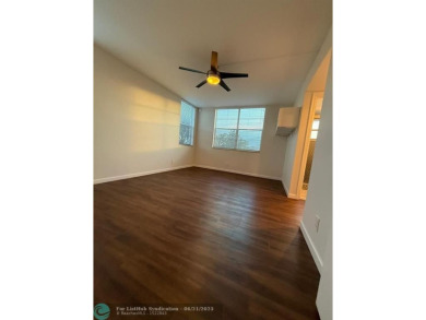 Experience the best of Pine Island Ridge in this spacious on Pine Island Ridge Country Club in Florida - for sale on GolfHomes.com, golf home, golf lot