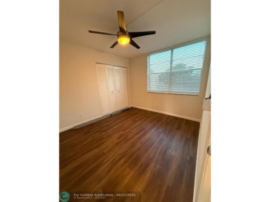 Experience the best of Pine Island Ridge in this spacious on Pine Island Ridge Country Club in Florida - for sale on GolfHomes.com, golf home, golf lot