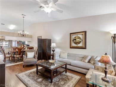 Experience stunning waterfront views from this beautifully on Bonita Fairways in Florida - for sale on GolfHomes.com, golf home, golf lot