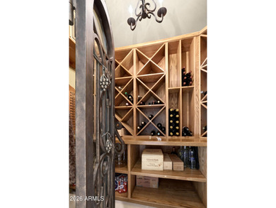 Located in the exclusive guard-gated community of Windy Walk in on Troon Country Club in Arizona - for sale on GolfHomes.com, golf home, golf lot