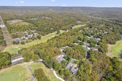 Experience luxury living at its finest in this custom-built on Ledgestone Country Club and Golf Course in Missouri - for sale on GolfHomes.com, golf home, golf lot