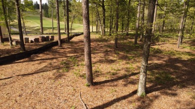This beautiful, wooded homesite is ideally located between on The Reserve Club At Woodside Plantation in South Carolina - for sale on GolfHomes.com, golf home, golf lot