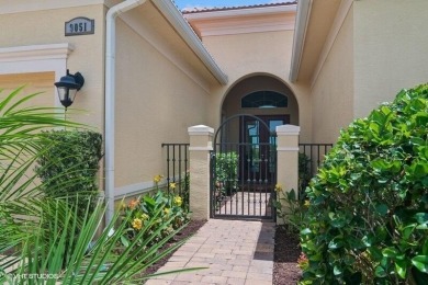 Nestled within the secured, resort-style gates of PGA Village on  in Florida - for sale on GolfHomes.com, golf home, golf lot