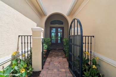 Nestled within the secured, resort-style gates of PGA Village on  in Florida - for sale on GolfHomes.com, golf home, golf lot