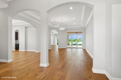 Nestled within the secured, resort-style gates of PGA Village on  in Florida - for sale on GolfHomes.com, golf home, golf lot