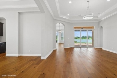Nestled within the secured, resort-style gates of PGA Village on  in Florida - for sale on GolfHomes.com, golf home, golf lot