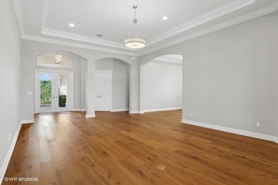 Nestled within the secured, resort-style gates of PGA Village on  in Florida - for sale on GolfHomes.com, golf home, golf lot