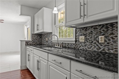 Welcome to this beautifully updated 3-bedroom, 2-bath home in on Hope Mills Golf and Country Club in North Carolina - for sale on GolfHomes.com, golf home, golf lot