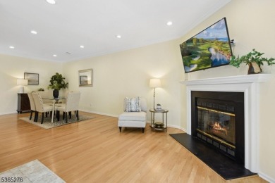 Experience elevated living in this sun-drenched, end-unit on Echo Lake Country Club in New Jersey - for sale on GolfHomes.com, golf home, golf lot