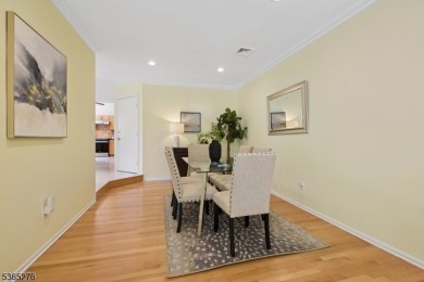 Experience elevated living in this sun-drenched, end-unit on Echo Lake Country Club in New Jersey - for sale on GolfHomes.com, golf home, golf lot