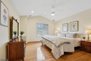 Experience elevated living in this sun-drenched, end-unit on Echo Lake Country Club in New Jersey - for sale on GolfHomes.com, golf home, golf lot