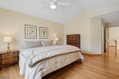 Experience elevated living in this sun-drenched, end-unit on Echo Lake Country Club in New Jersey - for sale on GolfHomes.com, golf home, golf lot