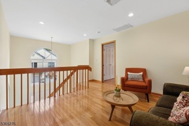 Experience elevated living in this sun-drenched, end-unit on Echo Lake Country Club in New Jersey - for sale on GolfHomes.com, golf home, golf lot