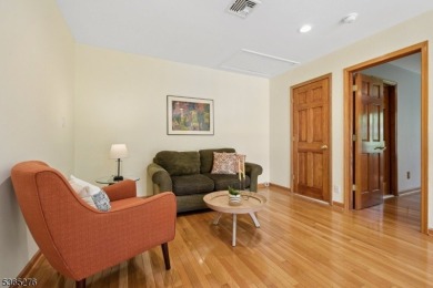 Experience elevated living in this sun-drenched, end-unit on Echo Lake Country Club in New Jersey - for sale on GolfHomes.com, golf home, golf lot