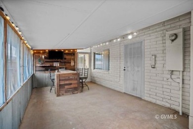 Run! Because this house is all that and a bag of chips! (If you on Mt. Graham Municipal Golf Course in Arizona - for sale on GolfHomes.com, golf home, golf lot