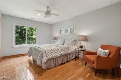 Experience elevated living in this sun-drenched, end-unit on Echo Lake Country Club in New Jersey - for sale on GolfHomes.com, golf home, golf lot