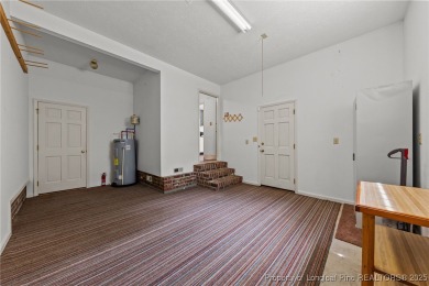 Welcome to this beautifully updated 3-bedroom, 2-bath home in on Hope Mills Golf and Country Club in North Carolina - for sale on GolfHomes.com, golf home, golf lot