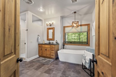 This stunning home offers timeless craftsmanship, luxurious on The Coves Golf Course in Oklahoma - for sale on GolfHomes.com, golf home, golf lot