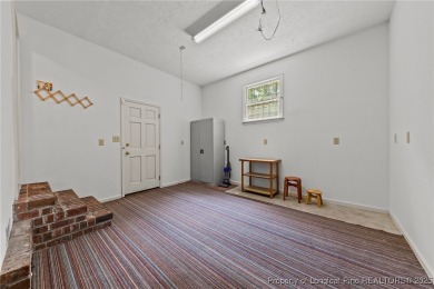 Welcome to this beautifully updated 3-bedroom, 2-bath home in on Hope Mills Golf and Country Club in North Carolina - for sale on GolfHomes.com, golf home, golf lot