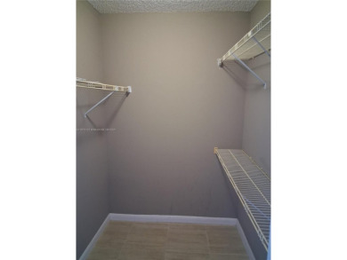 Come turn this 1,275 sf 2 Bdrm 2 Ba Convertible with the wall up on Pembroke Lakes Golf Club in Florida - for sale on GolfHomes.com, golf home, golf lot