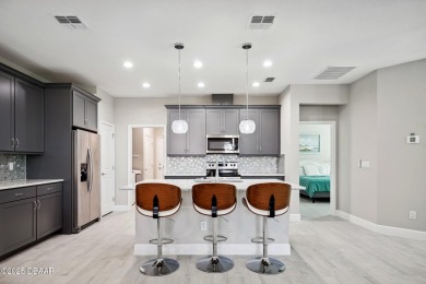 JUST REDUCED!!! Exquisitely FURNISHED CAMELLIA COTTAGE!! Move-in on LPGA International Golf Course in Florida - for sale on GolfHomes.com, golf home, golf lot