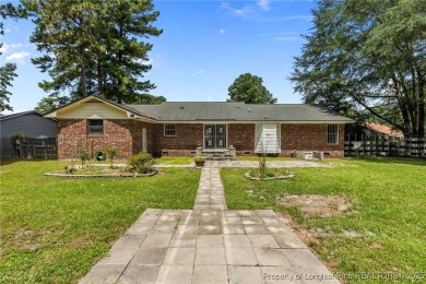 Welcome to this beautifully updated 3-bedroom, 2-bath home in on Hope Mills Golf and Country Club in North Carolina - for sale on GolfHomes.com, golf home, golf lot