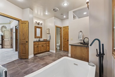 This stunning home offers timeless craftsmanship, luxurious on The Coves Golf Course in Oklahoma - for sale on GolfHomes.com, golf home, golf lot