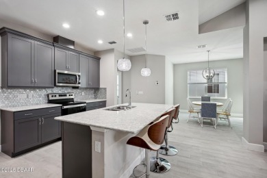 JUST REDUCED!!! Exquisitely FURNISHED CAMELLIA COTTAGE!! Move-in on LPGA International Golf Course in Florida - for sale on GolfHomes.com, golf home, golf lot