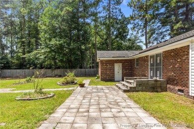Welcome to this beautifully updated 3-bedroom, 2-bath home in on Hope Mills Golf and Country Club in North Carolina - for sale on GolfHomes.com, golf home, golf lot