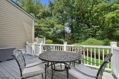 Experience elevated living in this sun-drenched, end-unit on Echo Lake Country Club in New Jersey - for sale on GolfHomes.com, golf home, golf lot