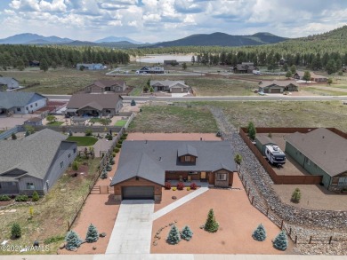 Discover this beautiful single-level home in historic Williams on Elephant Rocks at Williams in Arizona - for sale on GolfHomes.com, golf home, golf lot