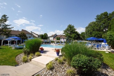 Experience elevated living in this sun-drenched, end-unit on Echo Lake Country Club in New Jersey - for sale on GolfHomes.com, golf home, golf lot