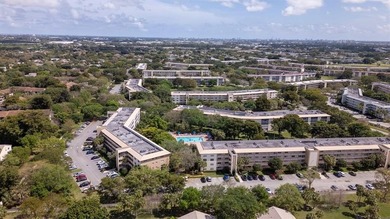 Stunning turn key furnished  2/2 Corner Unit in Wynmoor's on Wynmoor Golf Course in Florida - for sale on GolfHomes.com, golf home, golf lot