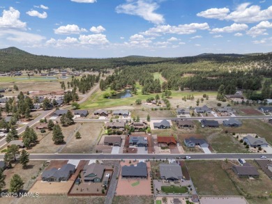 Discover this beautiful single-level home in historic Williams on Elephant Rocks at Williams in Arizona - for sale on GolfHomes.com, golf home, golf lot